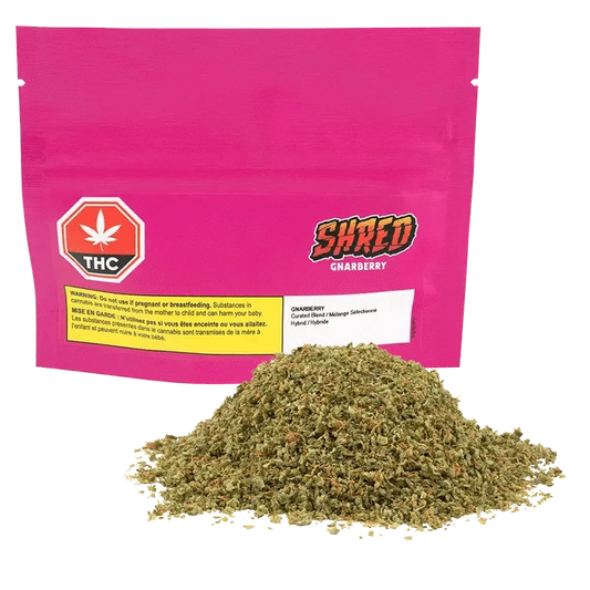 Close-up of the Gnarberry package, showcasing bold red branding and a minimalist design against a dark background.