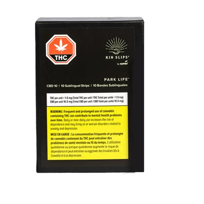 A close-up, angled view of Park Life CBD Strips packaging featuring dark blue and gold text on a black background.