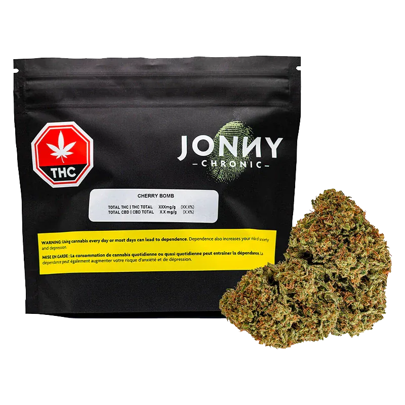 Front-facing shot of a black pouch and a 28 g bud pile labeled Jonny Chronic Cherry Bomb against a white background.