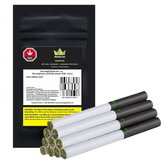 Close-up of Redees Cold Creek Kush Pre Rolled 10 x 0.4 g packaging with French warning text against a plain white background.