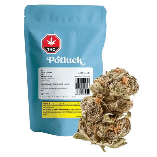 A close-up of the Frosted Cherry package against a dark background, featuring a colorful floral design.