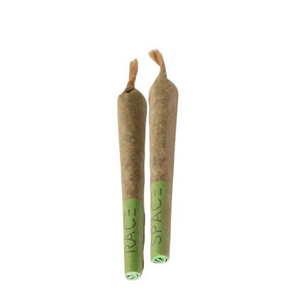 A close-up shot of two Galaxy Skippers Pre Rolled 0.4 g joints, angled slightly against a plain white background.