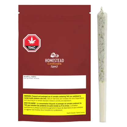 Front view of a red Homestead Cannabis Supply Bangtail PR 60 x 0.5 g pouch standing next to a rolled joint on a white background.