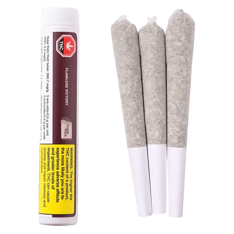 Close-up of the Flawless Victory Pre Rolled 3 x 0.5 g packaging with warning details, presented at a slight angle against a dark backdrop.