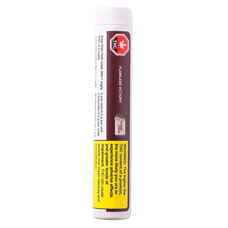 Close-up of the Flawless Victory Pre Rolled 3 x 0.5 g packaging with a warning label, presented at a slight angle against a dark background.