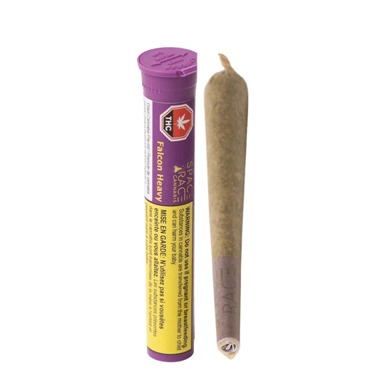 Close-up of the Falcon Heavy Pre Rolled 1 x 1 g packaging with bold graphics and warning labels against a black background.