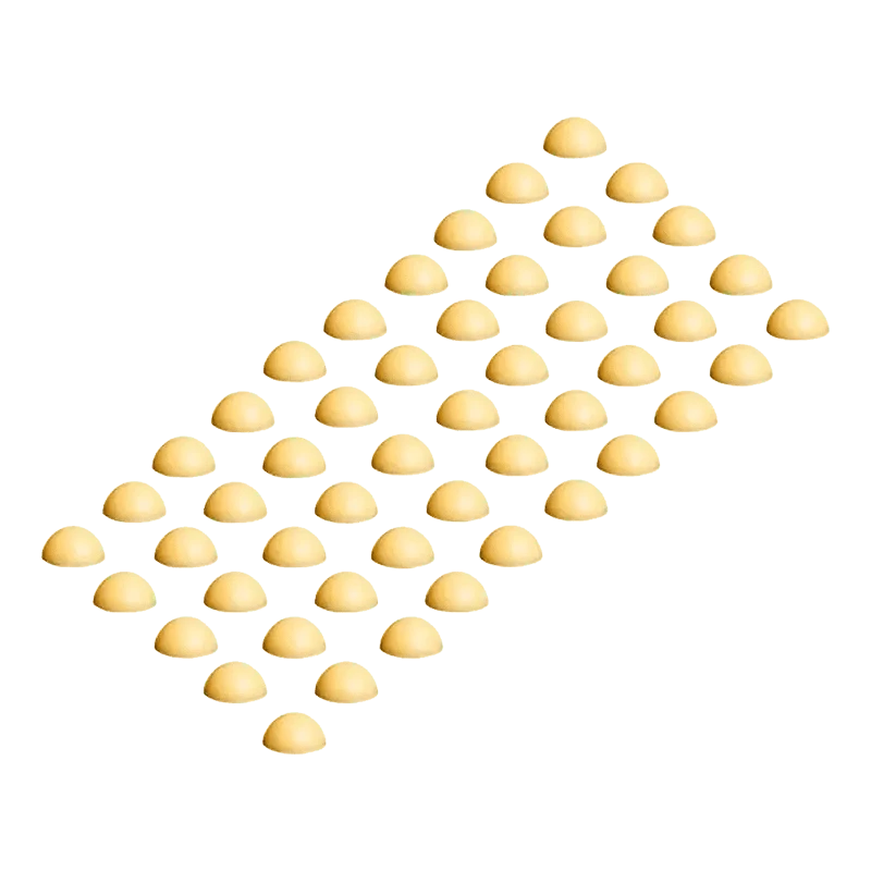 Overhead view of Hash Rosin Drops, golden-toned drops scattered across a neutral background.