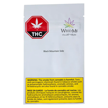 Front-facing image of the WeedMe Black Mountain Side pouch on a white background showing a red THC stop sign logo, the WeedMe leaf logo, and a yellow warning box at the bottom.
