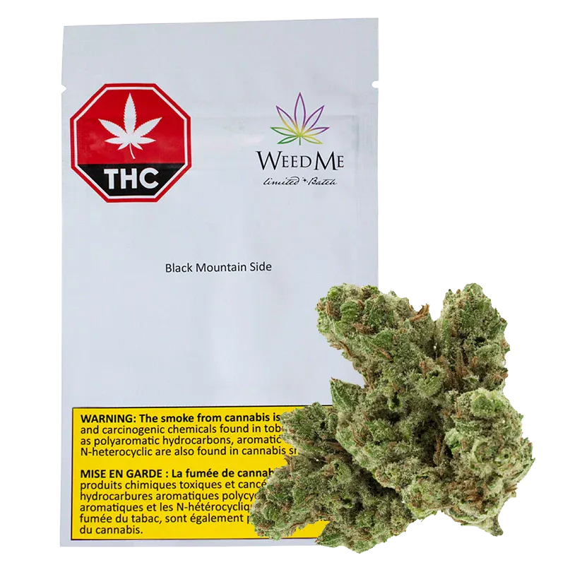 Front view of a white pouch labeled "Black Mountain Side" from WeedMe with a red THC octagon at top left and a cannabis bud placed in front.