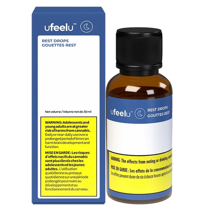 Ufeel Rest Drops (CBD:CBN) packaging is shown in a close-up, angled shot with a dark background, featuring bold text and branding.