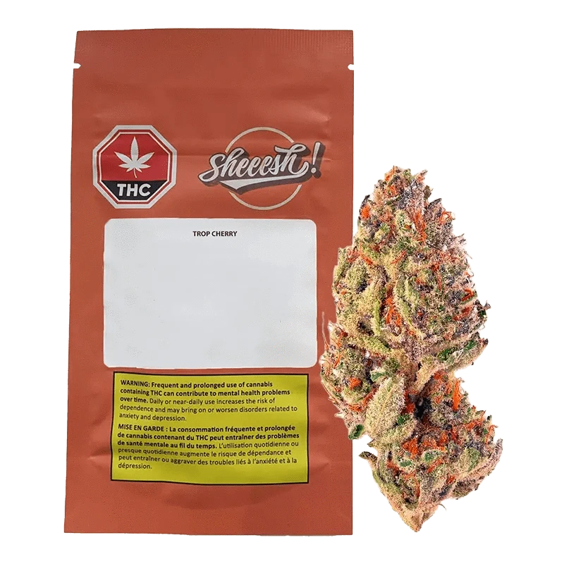 Trop Cherry packaging displays a warning message against prolonged cannabis use on a black background.