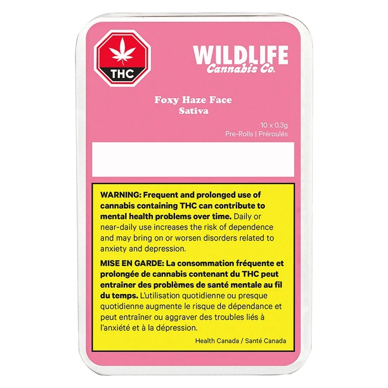 Rectangular front-facing tin with a pink label reading Wildlife Cannabis Co. Foxy Haze Face PR 10 x 0.3 g above a yellow bilingual THC health warning.