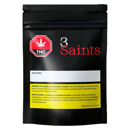 Front-facing shot of the black 3 Saints pouch labeled Kush Cookies PR 10 x 0.35 g with a red THC octagon and yellow warning panel.