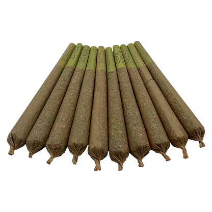 Low-angle front view of a neat row of ten Super Heavies PR 10 x 1 g pre-rolls with green tips on a white background