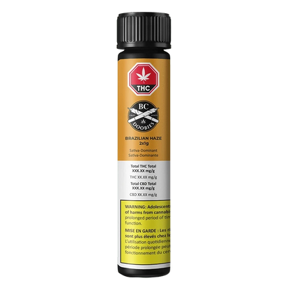 Front-facing shot of the cylindrical tube packaging labeled "Brazilian Haze PR 2 x 1 g" with a gold and white label, warning panel, and black screw cap.