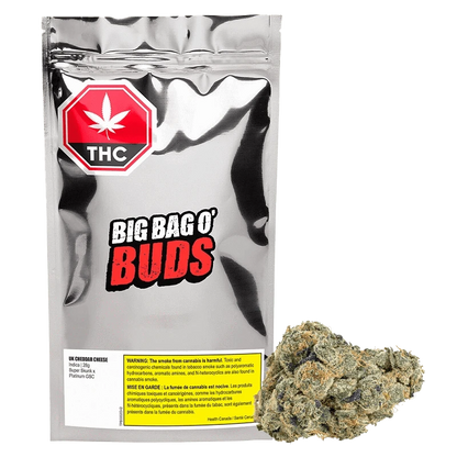 Close-up of the UK Cheddar Cheese packaging, featuring bold red and white typography on a dark background.