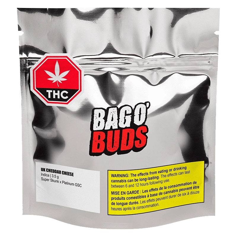 Front view of the UK Cheddar Cheese product packaging with bold text on a dark background.