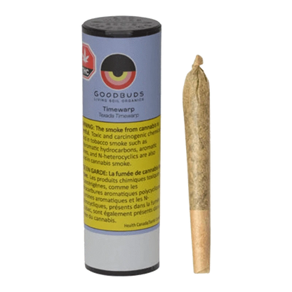 Close-up of a lit Timewarp Pre Rolled 1 x 1 g joint, showing smoke rising against a dark background.