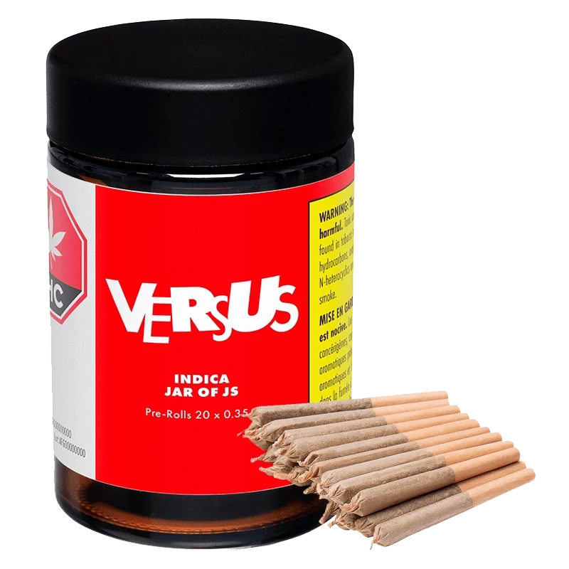 Close-up of the Indica Jar of Js Pre Rolled 20 x 0.35 g, showcasing its labeled container in a slightly angled, brightly lit shot.