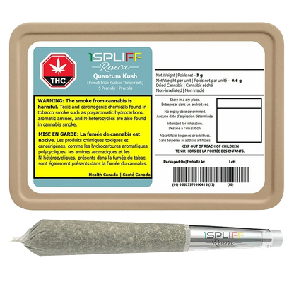 A close-up of the Quantum Kush Premium Glass Tip Pre Rolled 5 x 0.6 g packaging with a vibrant green cannabis leaf and warning text.