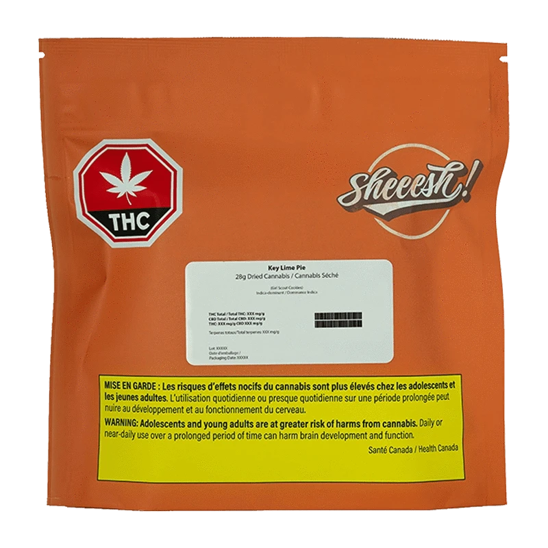 Front view of the Key Lime Pie package with warning text, angled slightly to the right, against a black background.