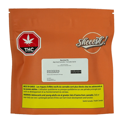 Front view of the Key Lime Pie package with warning text, angled slightly to the right, against a black background.