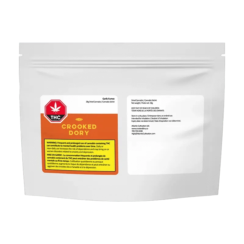 Close-up of the Garlic Fumez package with a warning label, shot at a slight angle against a dark background.