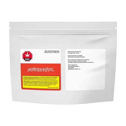 Front view of the sealed package for GG4 x Alien Technology cannabis, displaying bold branding against a dark background.