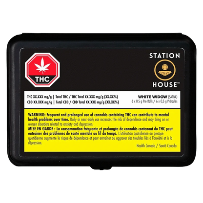 Close-up of the White Widow Pre Rolled 6 x 0.5 g packaging, displaying a dark background with branding and text in a vertical composition.