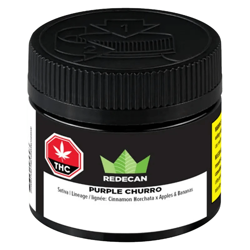 Close-up of the Redecan Purple Churro package, displaying bold branding against a dark background.