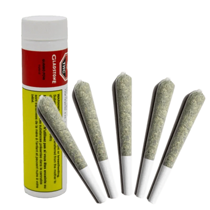 A close-up, angled view of five Gladstone Gumbo Pow Pre Rolled 0.5 g pre-rolls against a dark, blurred background.