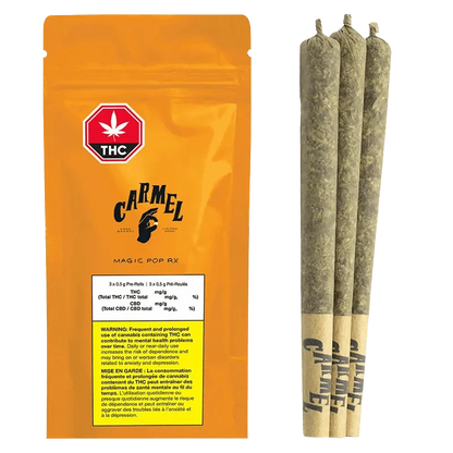 Close-up of the Magic Pop RX Pre Rolled 3 x 0.5 g packaging against a dark background, highlighting the vibrant logo and text details.