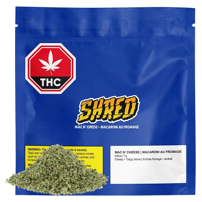 Front view of the Mac n' Cheese packaging, featuring bold red text over a dark background.