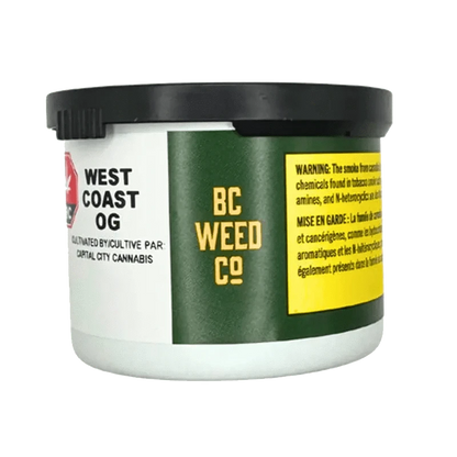 Close-up of the “West Coast OG” packaging, a dark label with white and yellow text angled on a black container.
