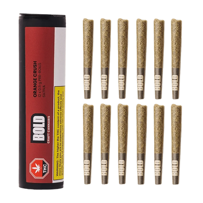 Close-up of the Orange Crush Pre Rolled 12 x 0.5 g pre-rolls against a black background, highlighting the product's branding.