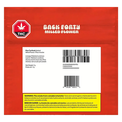 Close-up of the “Pine Tar Kush” packaging with a dark background and prominent THC logo, emphasizing its branding.