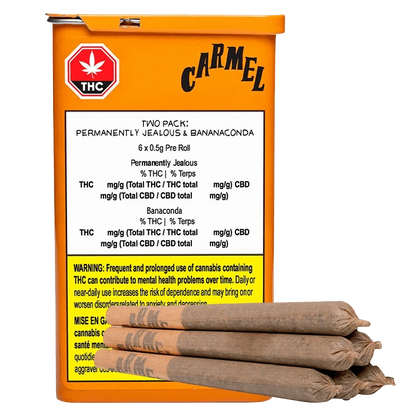Three-quarter view of an orange tin and stacked pre-rolls labeled Two Pack Permanently Jealous x Bananaconda PR 6 x 0.5 g.