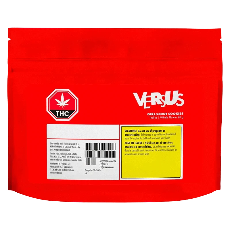 Rear view of the red VERSUS Girl Scout Cookies pouch with a white THC icon, barcode block, and yellow warning panel.