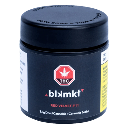 Front three-quarter view of the black blkmkt Red Velvet #11 jar with its childproof lid, THC emblem and red product text centered on the label.