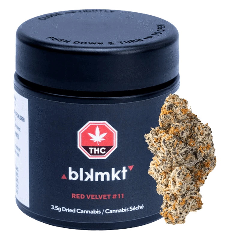 Front view of the black blkmkt Red Velvet #11 jar with THC logo and a close-up cannabis bud beside it.
