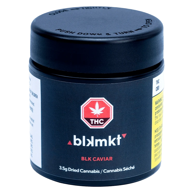 Three-quarter front view of the BLK Caviar black jar with a push-down lid, THC emblem and white-and-red label text.