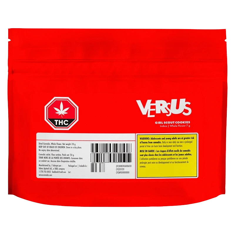Rear view of the bright red Versus Girl Scout Cookies pouch with white logo, THC symbol, barcode and a yellow warning panel.