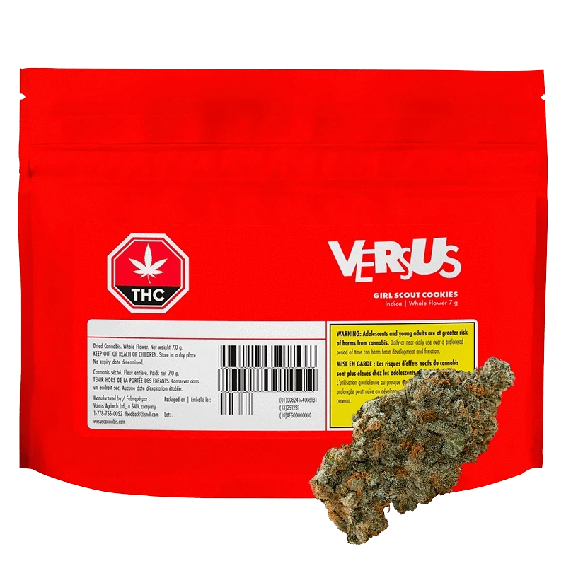 Front-facing red pouch labeled "Versus Girl Scout Cookies" with a barcode, THC symbol, warning box, and a cannabis bud in the lower right.