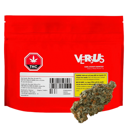 Front-facing red pouch labeled "Versus Girl Scout Cookies" with a barcode, THC symbol, warning box, and a cannabis bud in the lower right.