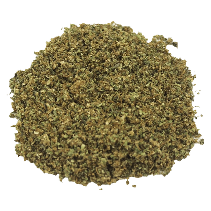 Top-down view of a loose, finely ground green-brown pile of "Pure Milled Sativa" against a plain white background.