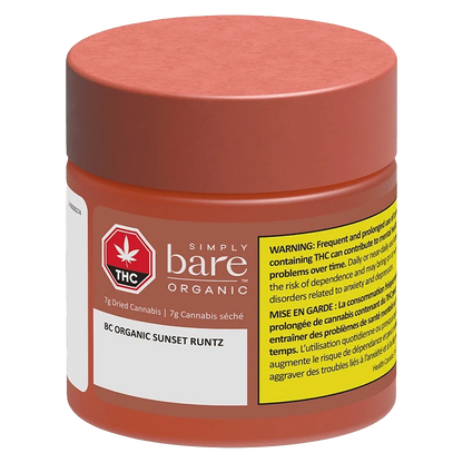 Front three-quarter view of a red jar labeled "BC Organic Sunset Runtz" from Simply Bare Organic with a yellow warning panel.