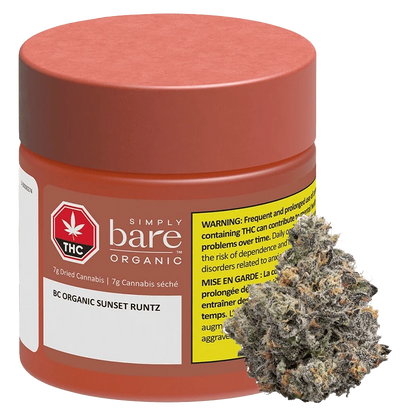 Three-quarter view of a red jar labeled BC Organic Sunset Runtz with a yellow warning panel and a cannabis bud positioned in front.