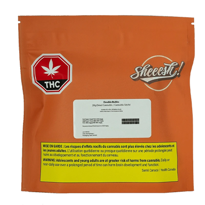 Front-facing orange pouch showing the Double Bubbs brand name on a white label with a THC stop sign and yellow bilingual warning panel.