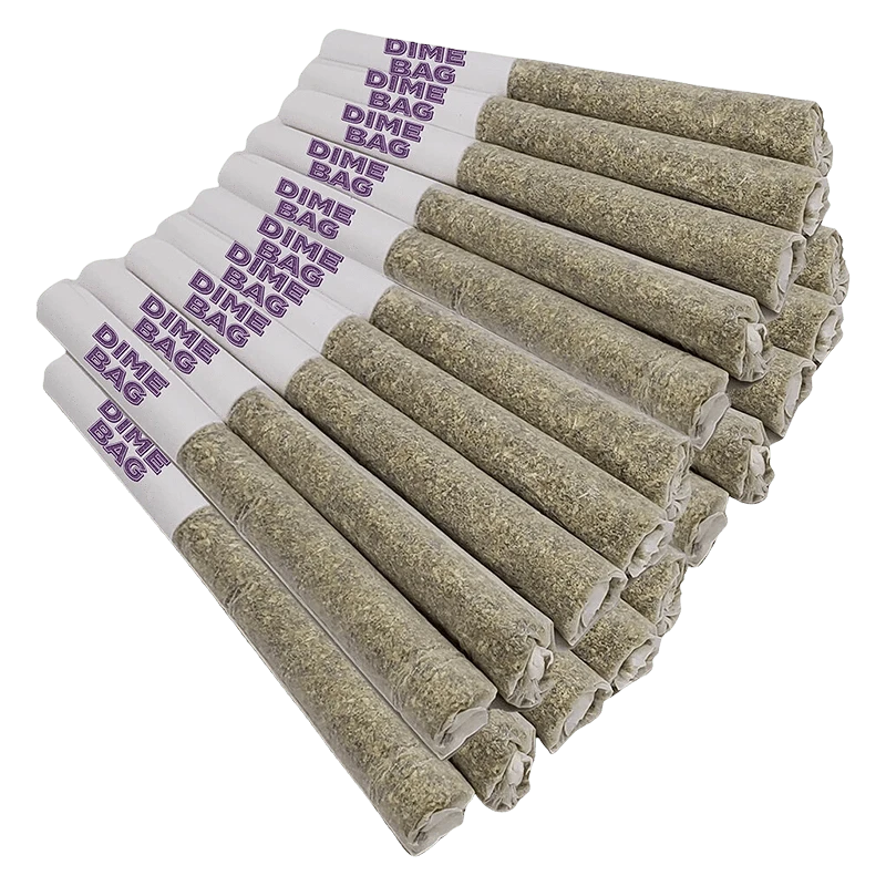 Angled close-up of a stacked row of Doozies Tropical Pocket Puffs PR 20 x 0.5 g pre-rolls with white purple‑stamped tips and tightly packed greenish herb ends.