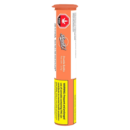 Tall vertical photo of the orange-and-white Double Bubbs PR 2 x 1 g tube, showing its THC symbol and yellow warning label.